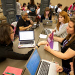 Women computing at the GHC 2014 Open Source Day.