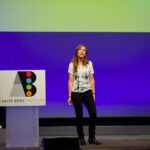 GHC 14 session speaker on stage