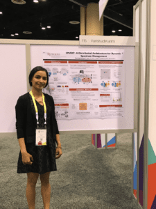 Parishad Karimi, the 1st place graduate winner of the ACM Student Research Competition, stands by her poster at the GHC 17 Poster Session