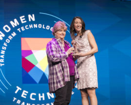 Dr. Rebecca Parsons accepts her Technical Leadership Abie Award on stage at the GHC 18 Opening Keynote