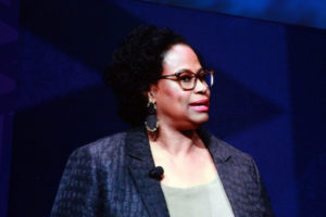 Brenda Darden Wilkerson stands on stage and welcomes the audience at the GHC 18 Opening Keynote